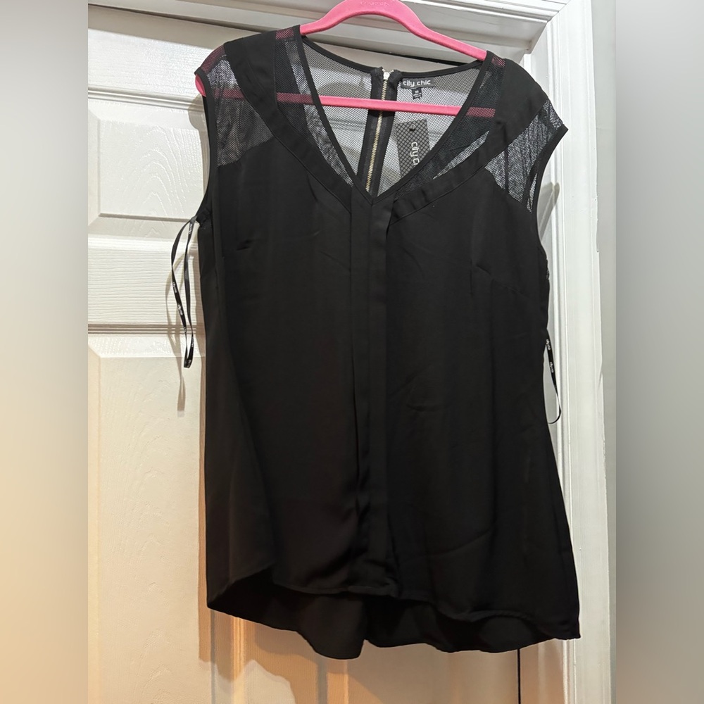 City Chic top with sheer from and back panels.